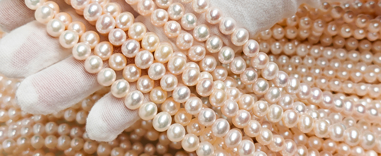 Sterling silver freshwater pearl necklace set with matching bracelet and stud earrings, classic style