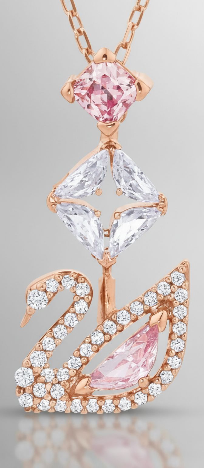 Modern brass swan jewelry set with blue, pink, and clear crystal stones
