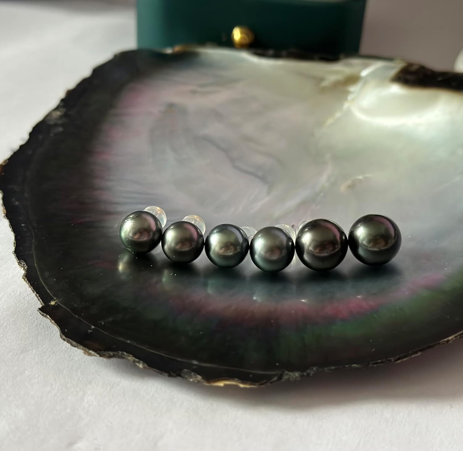 Tahitian black pearl stud earrings in sterling silver, classic elegant style