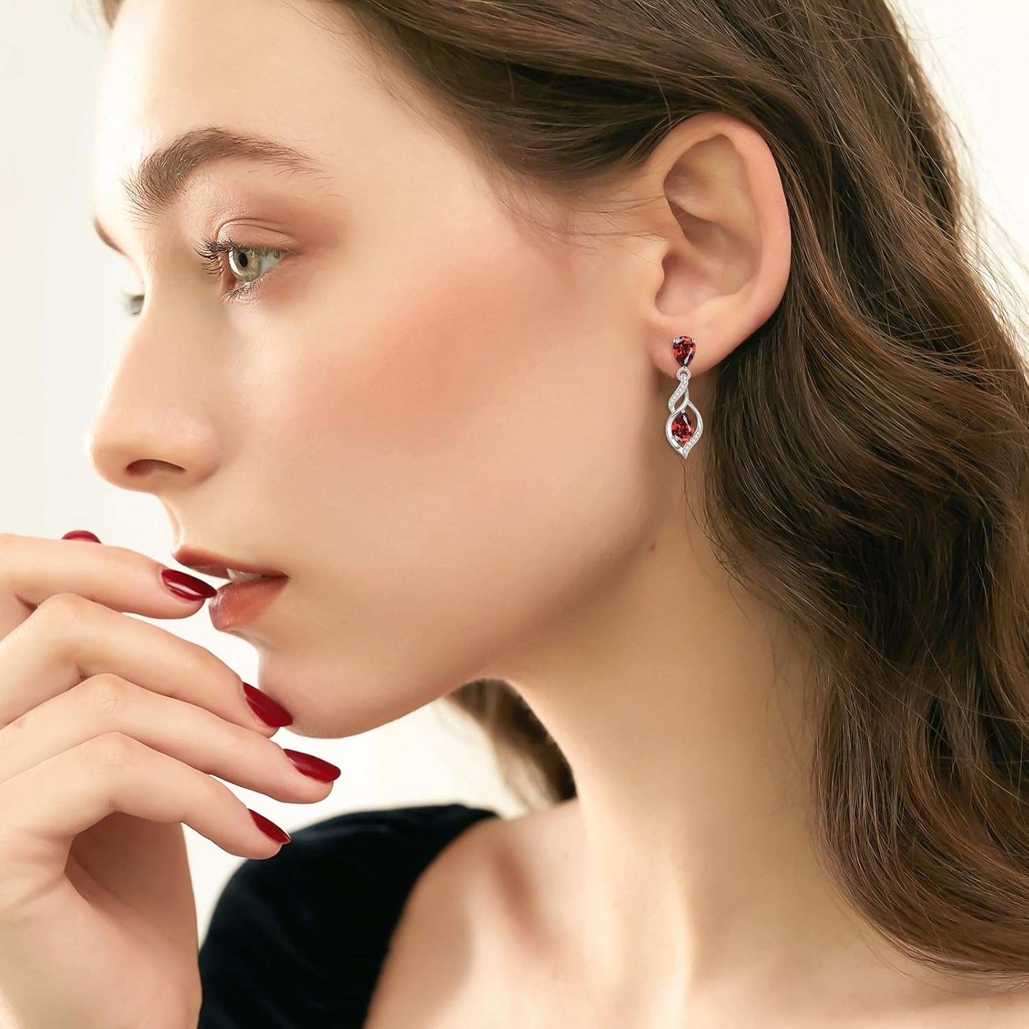 Sterling silver teardrop birthstone earrings with romantic infinity love design for women