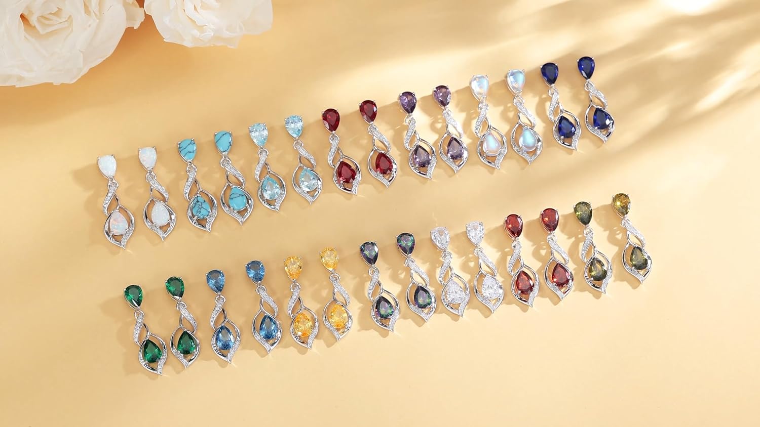 Sterling silver teardrop birthstone earrings with romantic infinity love design for women