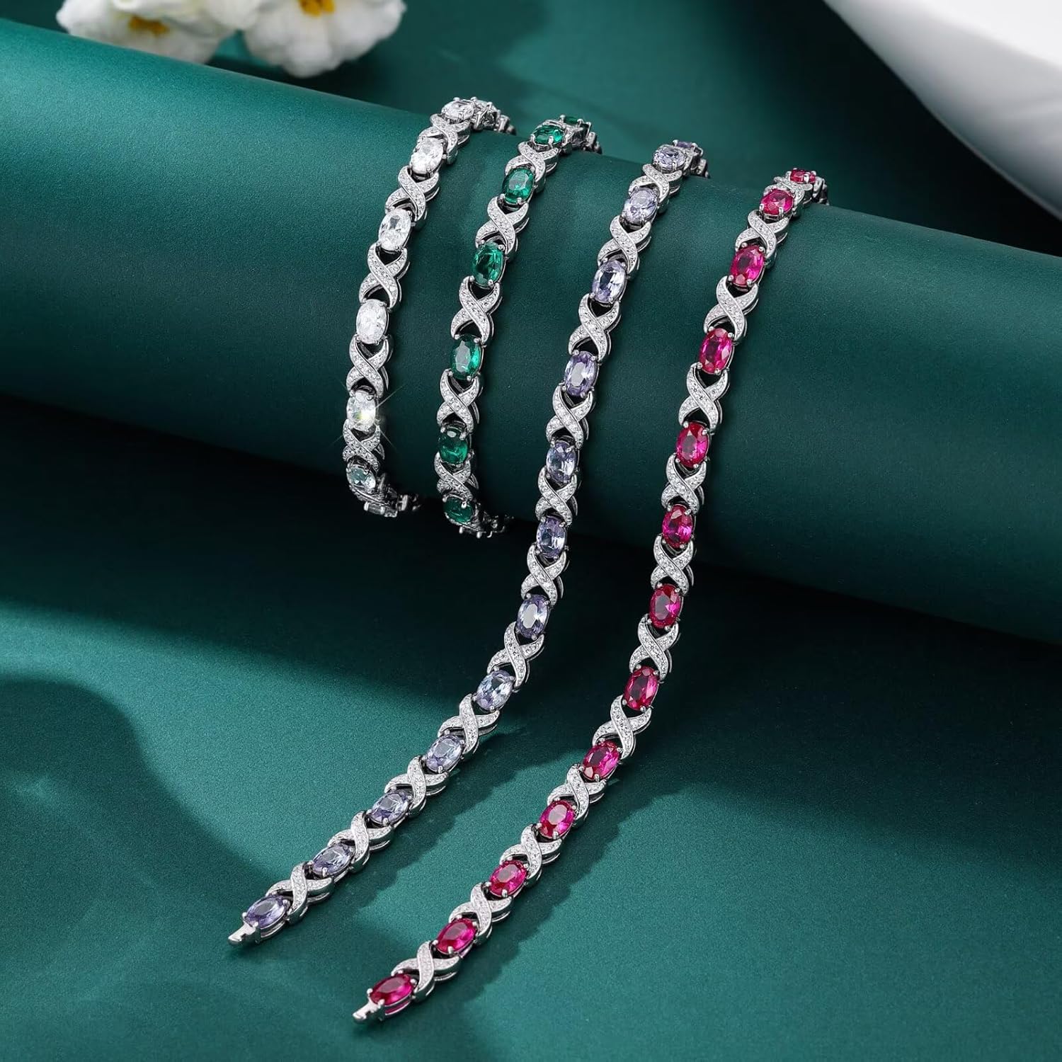 Classic oval birthstone tennis bracelet in 925 sterling silver with X O design, 7-8 inches