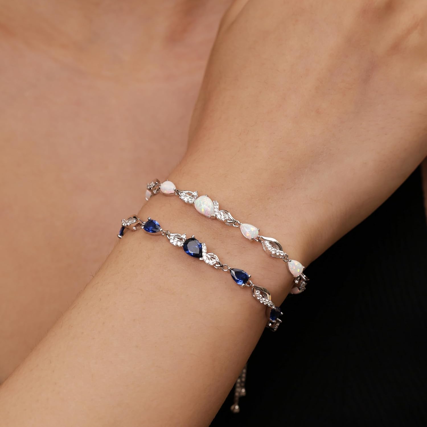 Sterling silver birthstone teardrop tennis bracelet with adjustable bolo chain, classic elegant design