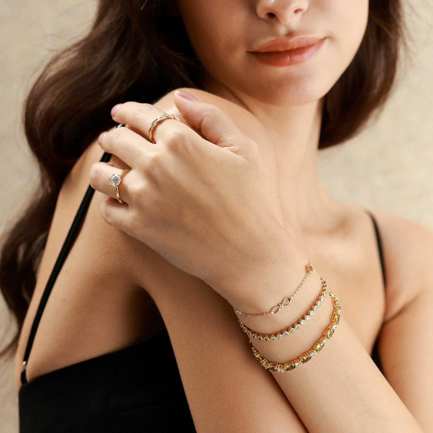 Adjustable sterling silver tennis bracelet with cubic zirconia stones and 14K gold plating, classic fine jewelry style