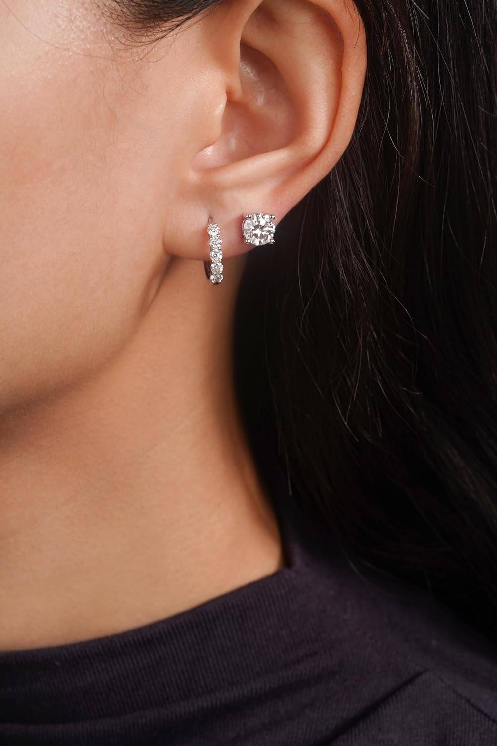 Sterling silver moissanite stud earrings with round brilliant cut stones, classic minimalist style