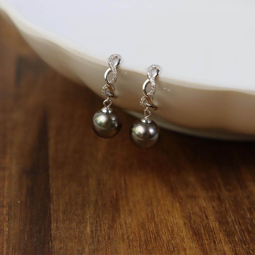 Sterling silver pearl drop earrings with romantic dangling design, 2-3 inches long