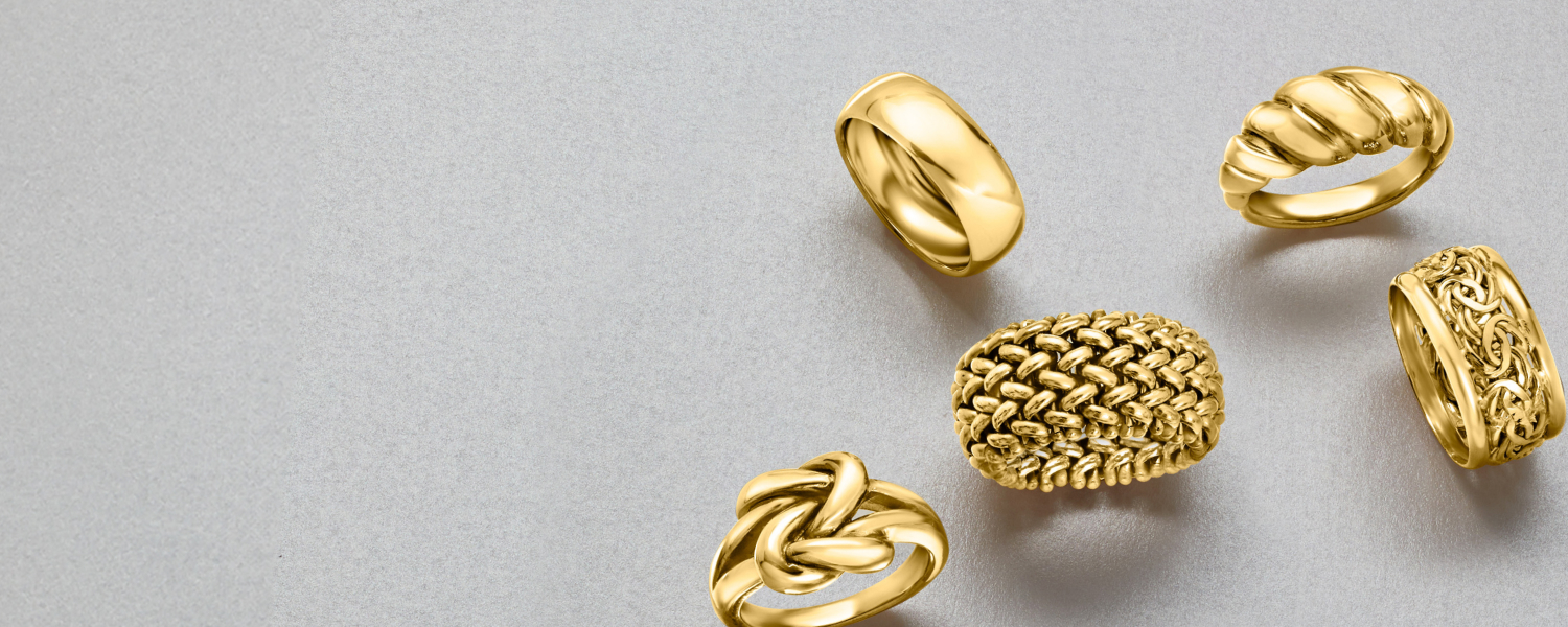 Round and baguette diamond multi-row statement ring in 14kt yellow gold