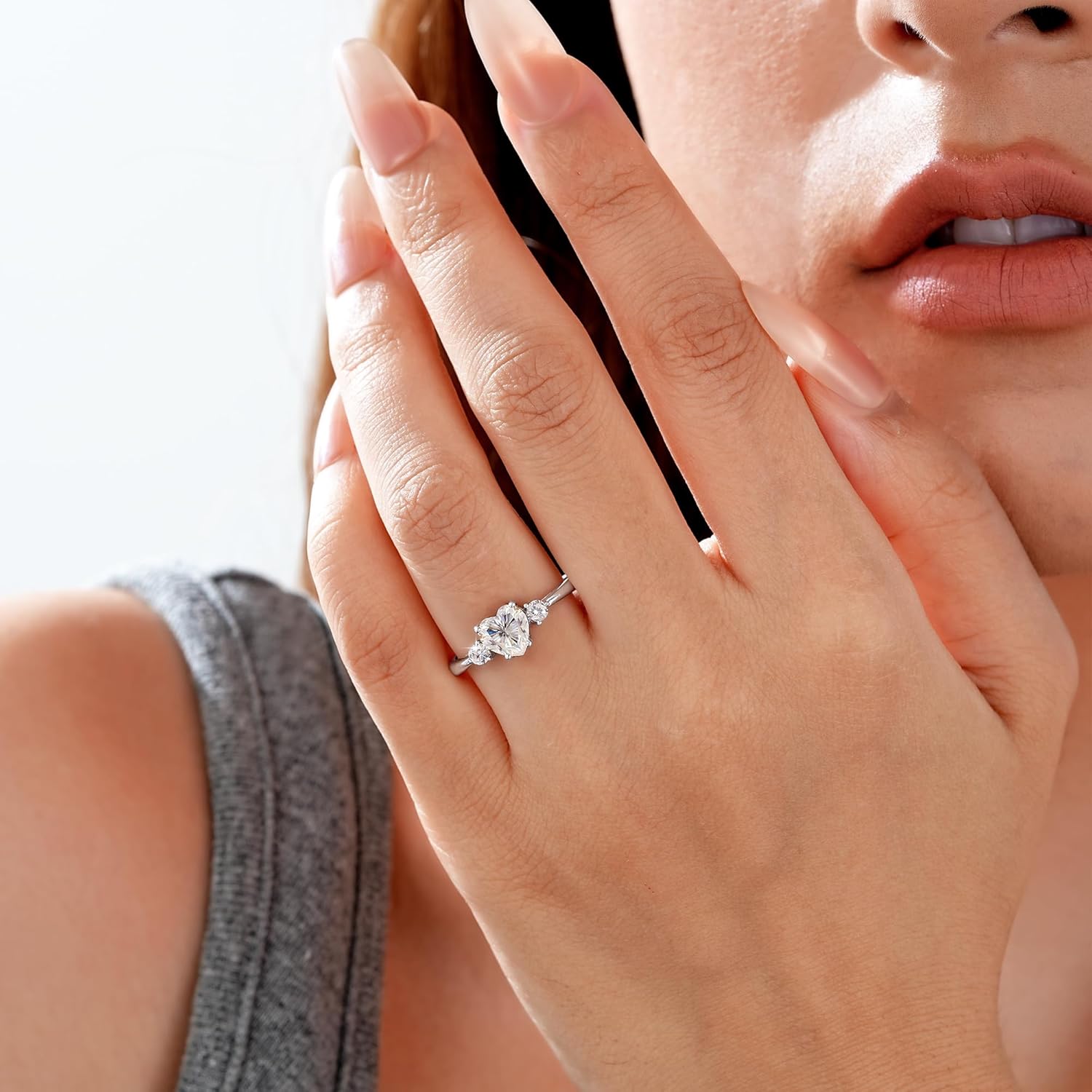 Sterling silver heart cut moissanite engagement ring with brilliant sparkle, romantic style