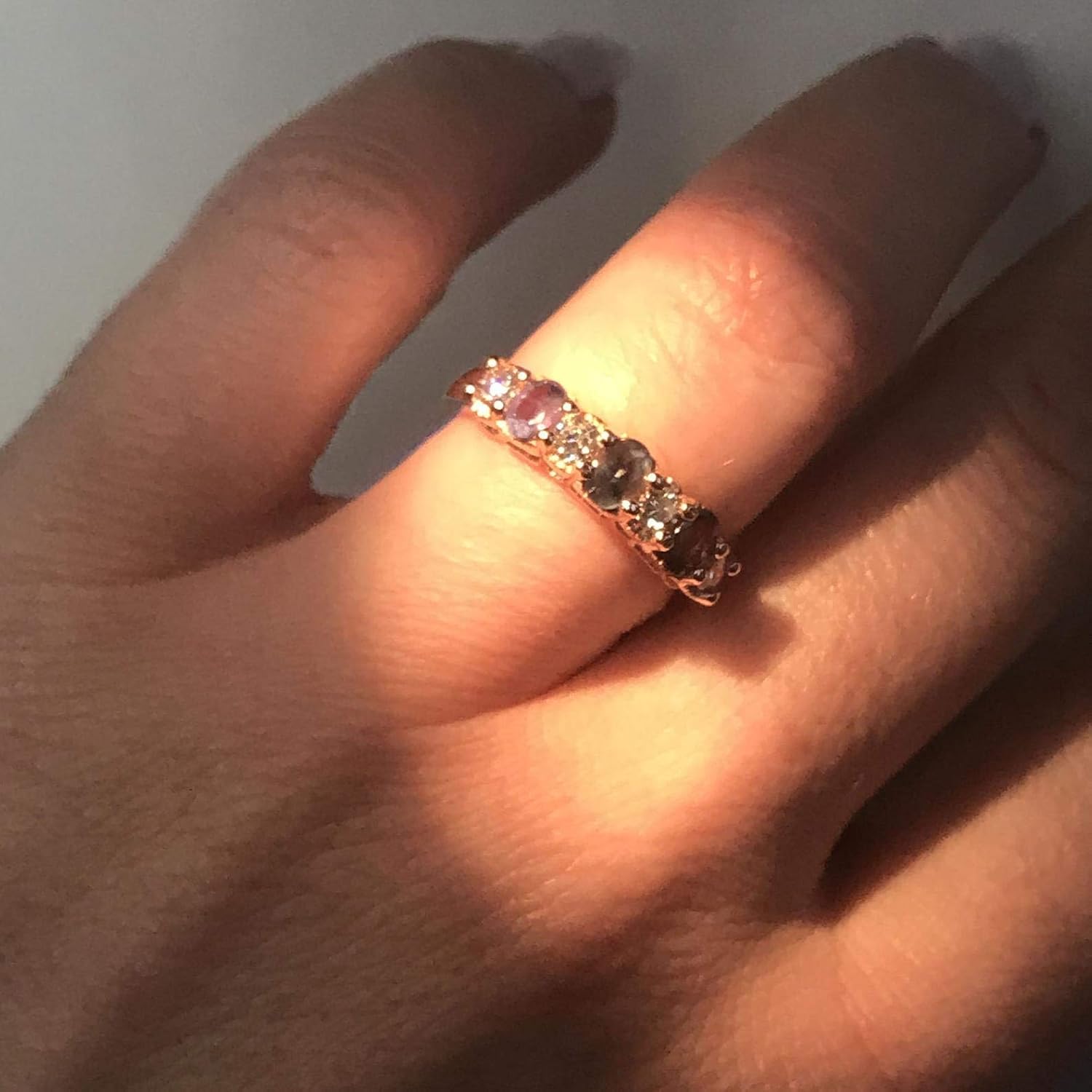 14k white gold anniversary band ring with natural alexandrite center stone surrounded by diamonds, 4.5mm band width