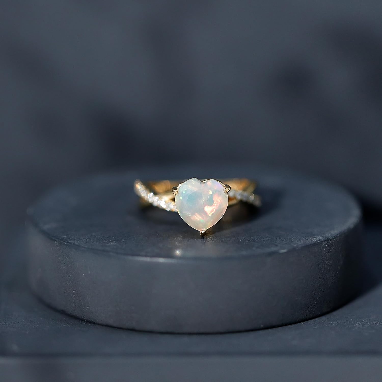 Sterling silver engagement ring featuring a heart-shaped Ethiopian opal stone with diamond accents, modern fine jewelry design