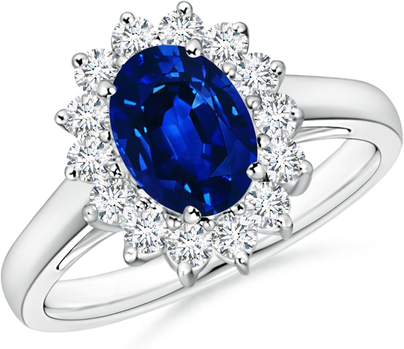Blue sapphire halo ring in 14K gold and platinum with romantic princess Diana inspired design