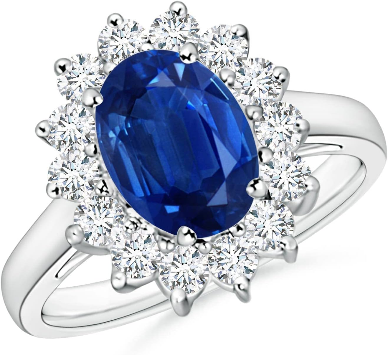 Blue sapphire halo ring in 14K gold and platinum with romantic princess Diana inspired design