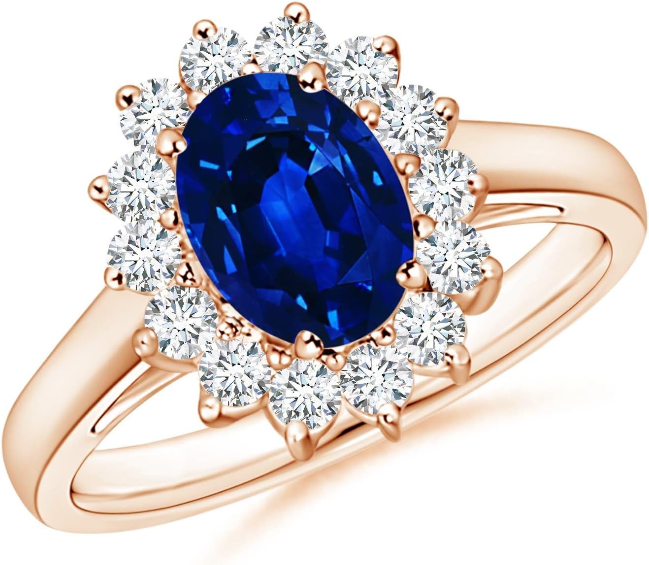 Blue sapphire halo ring in 14K gold and platinum with romantic princess Diana inspired design