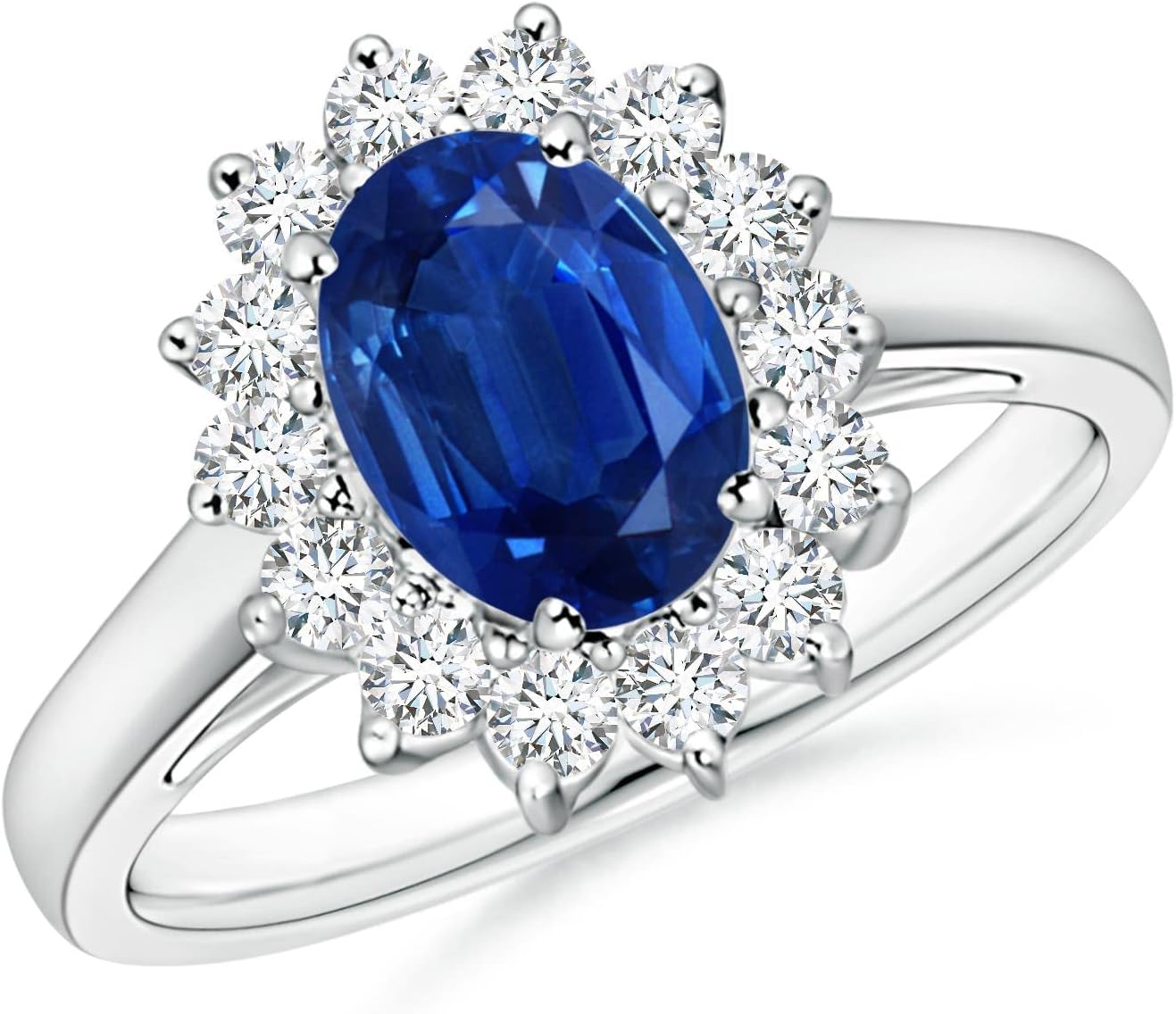 Blue sapphire halo ring in 14K gold and platinum with romantic princess Diana inspired design