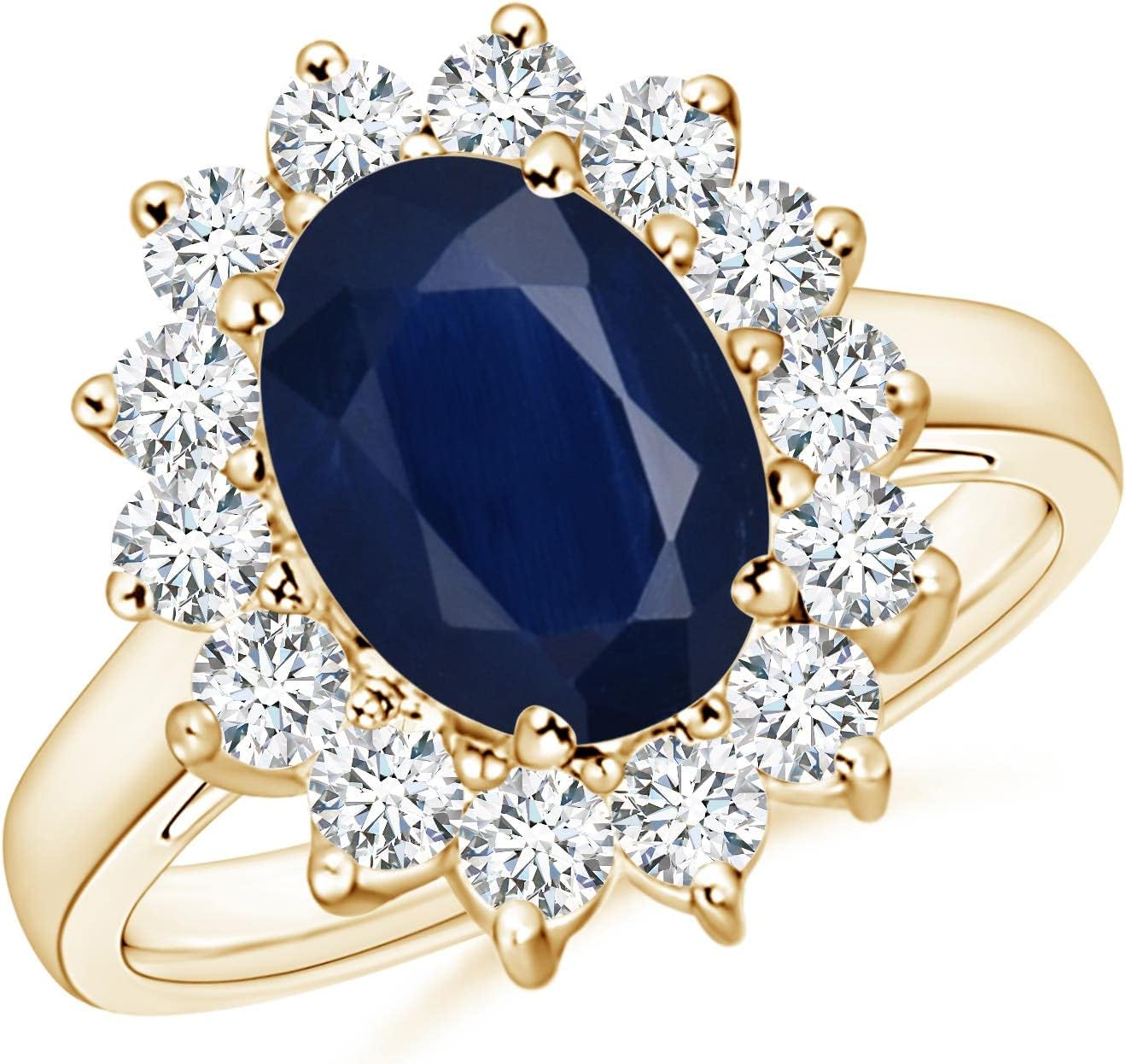 Blue sapphire halo ring in 14K gold and platinum with romantic princess Diana inspired design