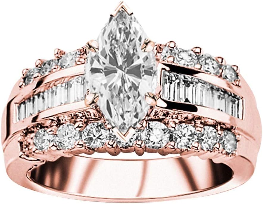 Marquise cut diamond engagement ring with baguette accents in 14k gold, classic channel set design
