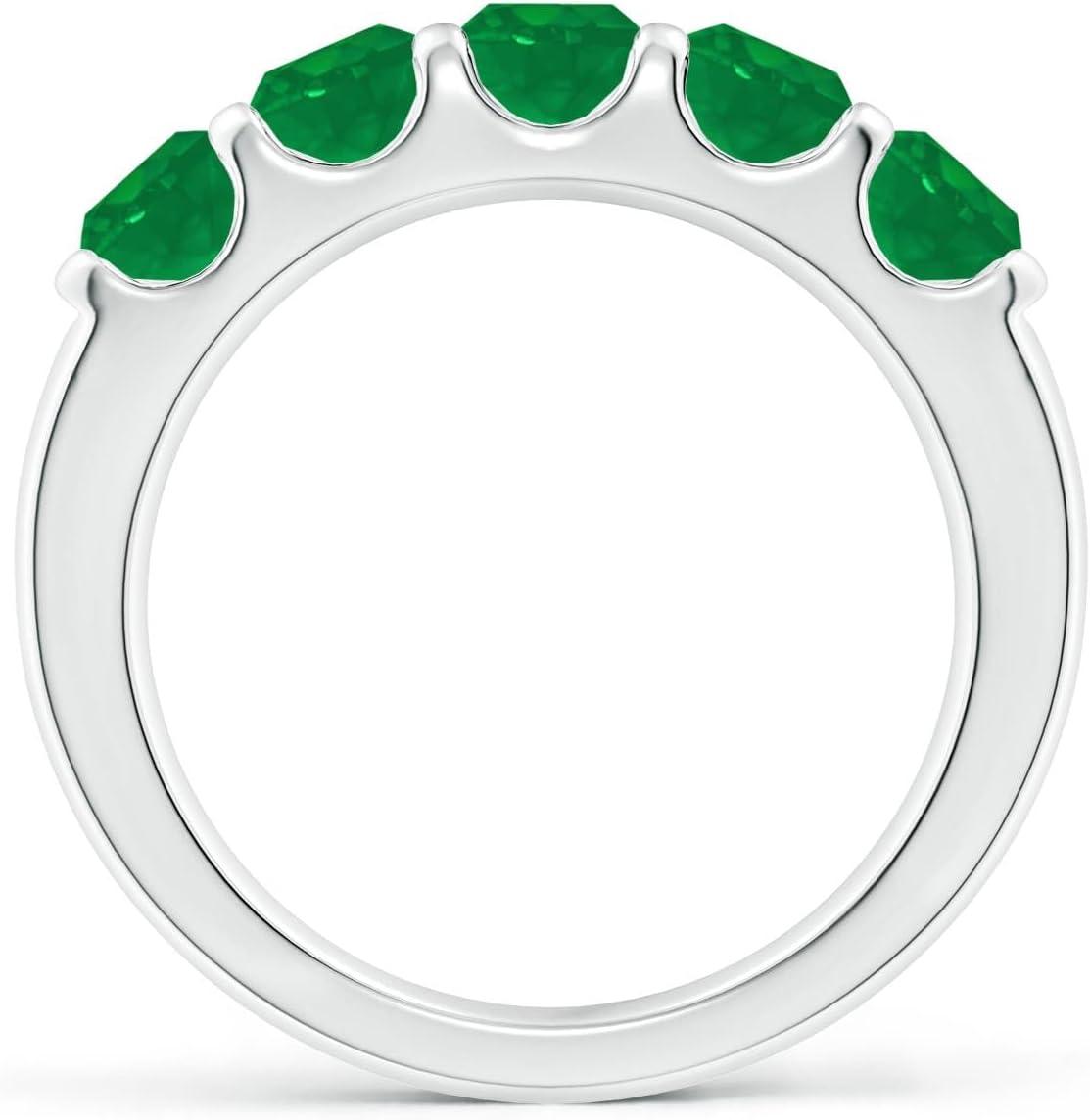 Emerald half eternity wedding band in 14K gold with shared prong setting, romantic gemstone design