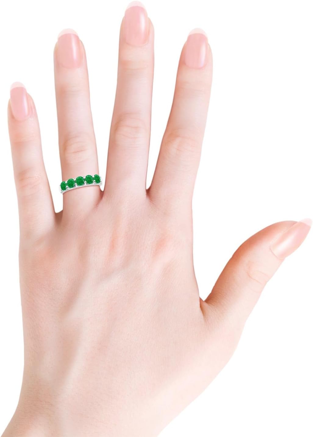 Emerald half eternity wedding band in 14K gold with shared prong setting, romantic gemstone design